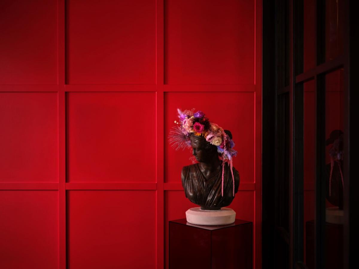Red wall Naumi Venue Hire